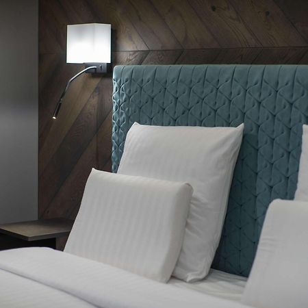 Pullman Riga Old Town Hotel Exterior foto A bed with a headboard