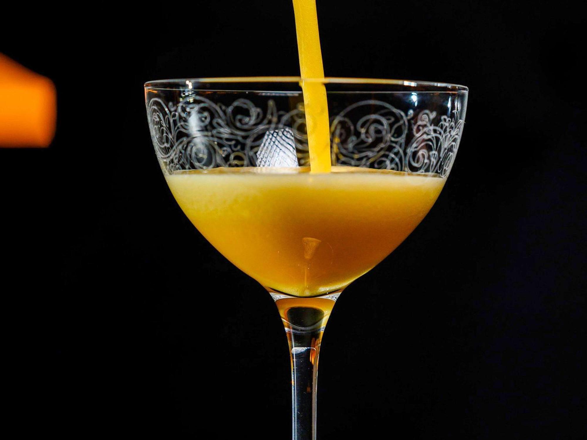Pullman Riga Old Town Hotel Exterior foto A glass of orange juice