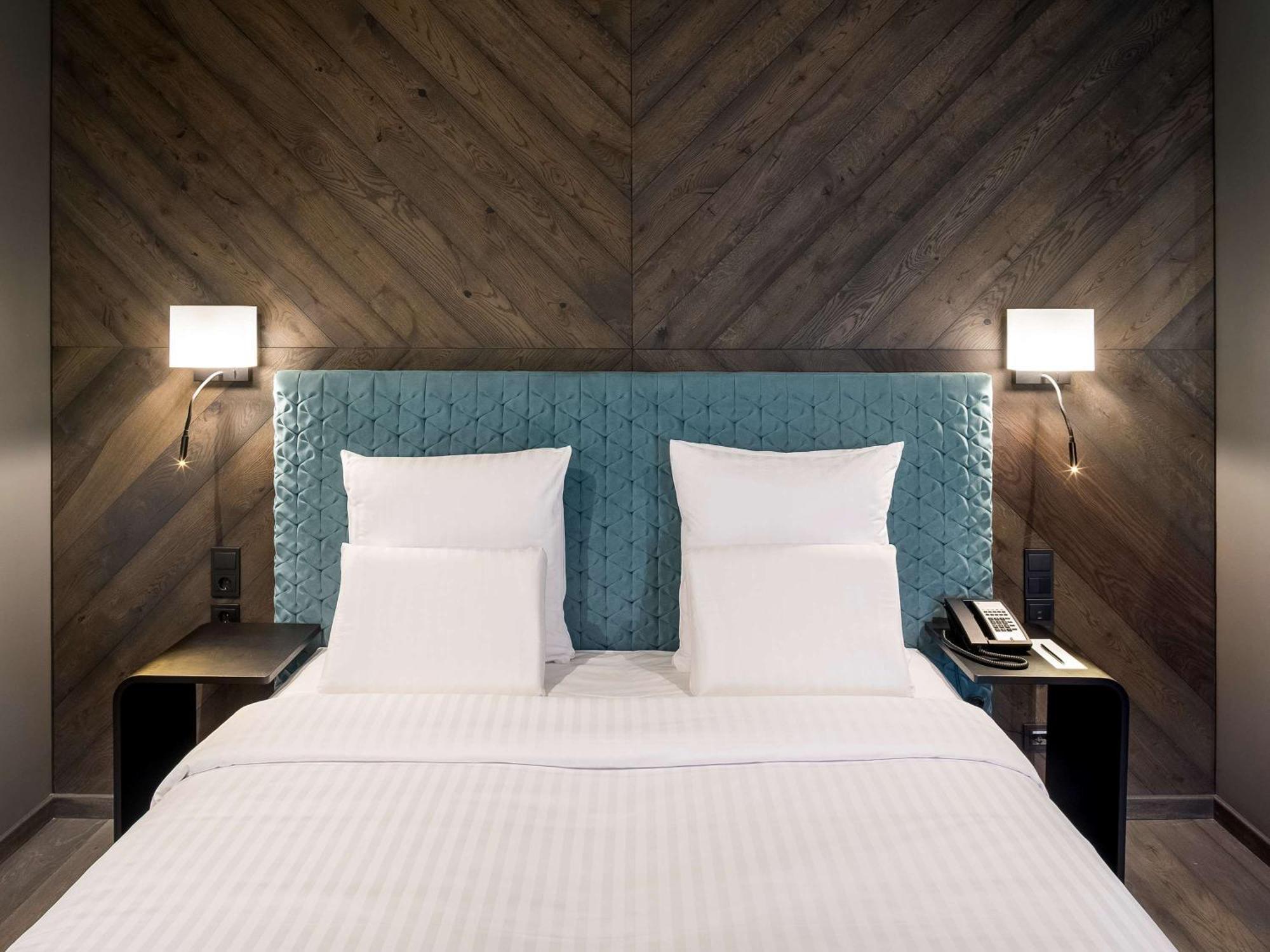 Pullman Riga Old Town Hotel Exterior foto A bedroom at the hotel